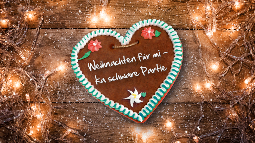 Lebkuchenherz mit der Aufschrift "Weihnachten für mi - ka schwere Partie