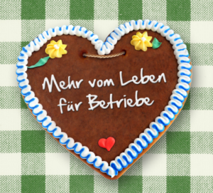 Lebkuchenherz mit Schrift "Mehr vom Leben für Betriebe"