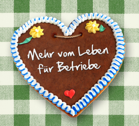 Lebkuchenherz mit Schrift "Mehr vom Leben für Betriebe"